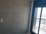 dormitorio pared forrada